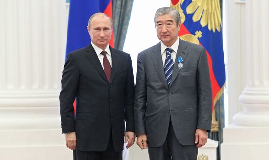 Vladimir Putin presents state awards