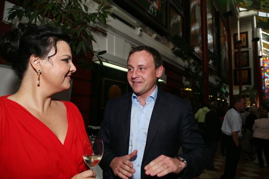 Reception celebrates 15th anniversary of Postscript program