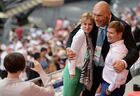 Nikolai Valuyev, center, boxer and Russian State Duma deputy, with Aleksei Nemov, four-time Olympic champion and vice president of the Russian Gymnastics Federation, and his wife, Galina, at the Kazan Arena before the opening ceremony of the 27th World Summer Universiade in Kazan. Location: Russia, Republic of Tatarstan, Kazan. Author: Alexey Filippov/Sputnik. Opening ceremony of 27th World Summer Universiade in Kazan