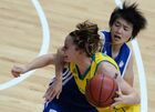 Member of the Australian national team Tess Madgen, left, and member of the Chinese Taipei national team Hung-Ying Huang during the match for 3rd place in women’s basketball between Australia and Chinese Taipei at the 27th World University Summer Games in Kazan. Location: Russia, Republic of Tatarstan, Kazan. Author: Alexey Filippov/Sputnik. 2013 Universiade. Day Ten. Basketball Women. Finals