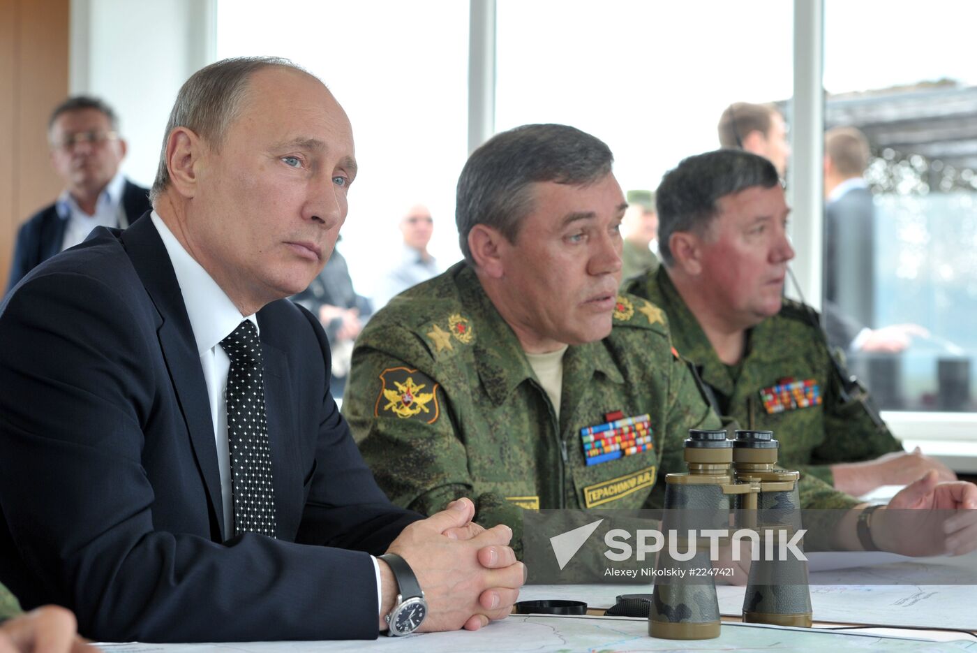 Vladimir Putin watches military exercise
