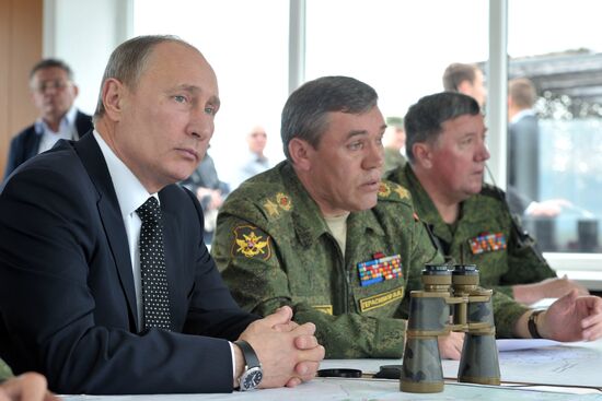 Vladimir Putin watches military exercise