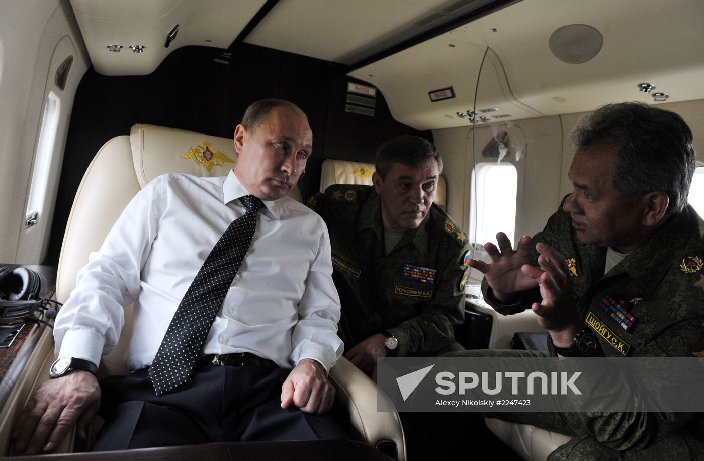 Vladimir Putin watches military exercise