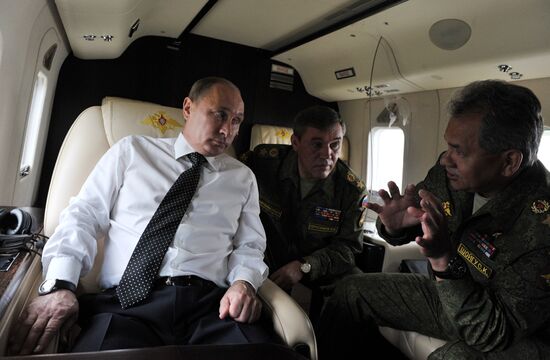 Vladimir Putin watches military exercise