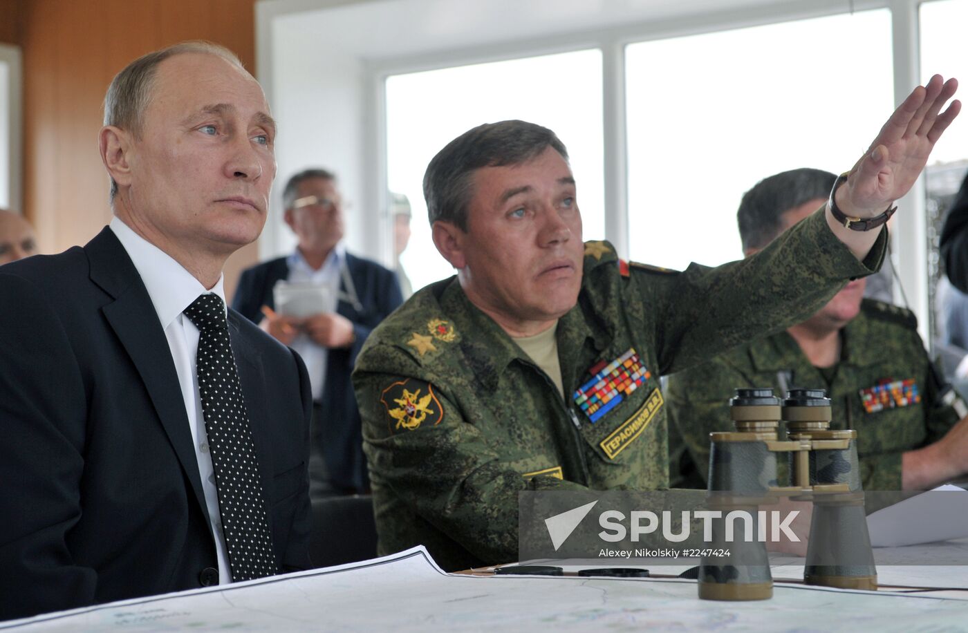 Vladimir Putin watches military exercise