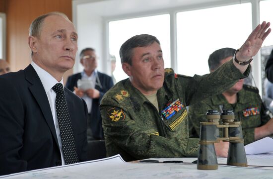 Vladimir Putin watches military exercise