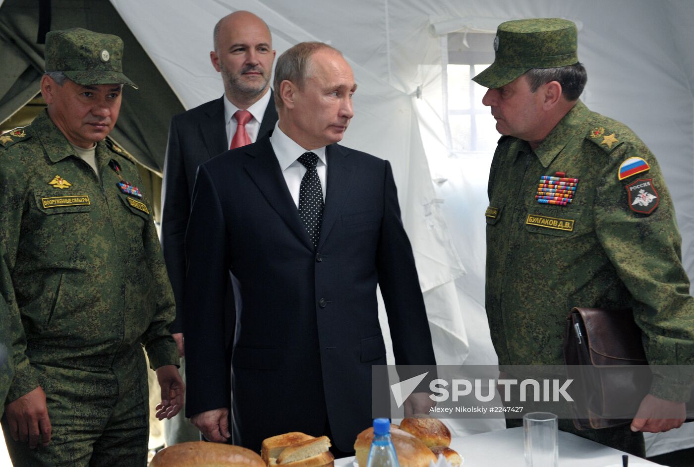 Vladimir Putin watches military exercise