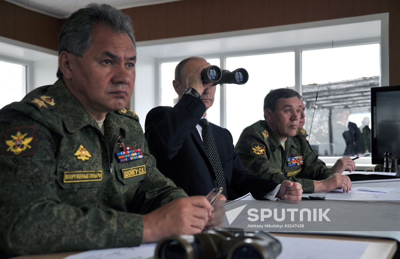 Vladimir Putin watches military exercise