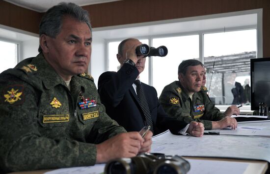 Vladimir Putin watches military exercise