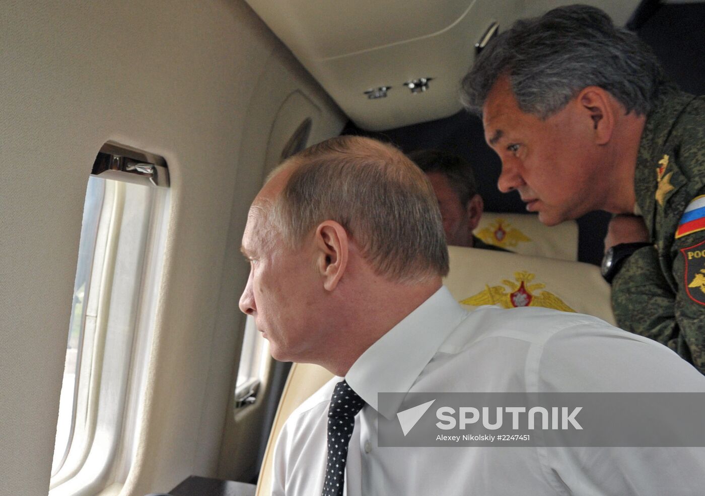 Vladimir Putin watches military exercise