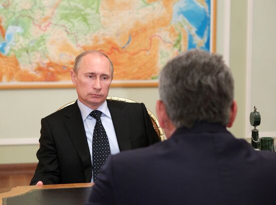 Vladimir Putin meets with Sergei Shoigu