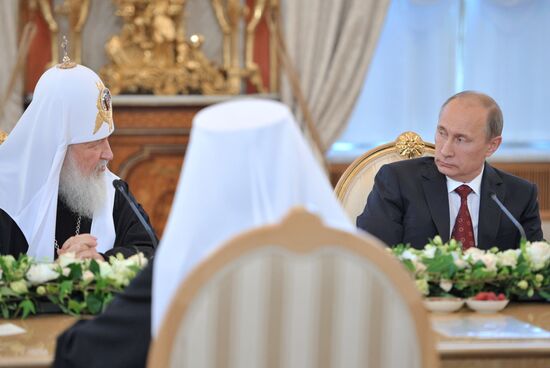 Vladimir Putin meets with top Orthodox Church clergy