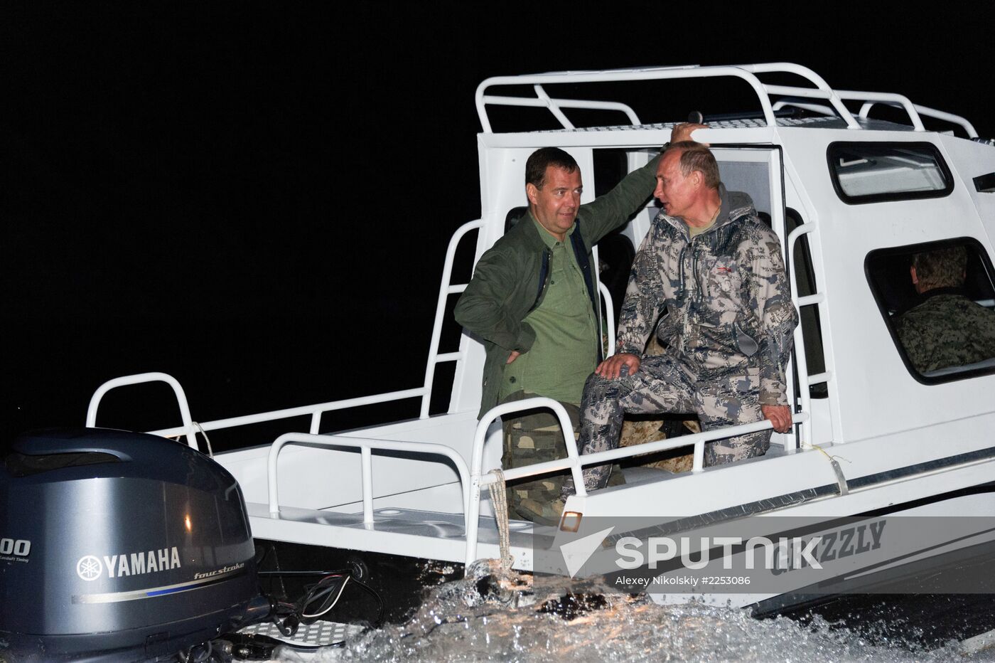 Vladimir Putin and Dmitry Medvedev on holiday