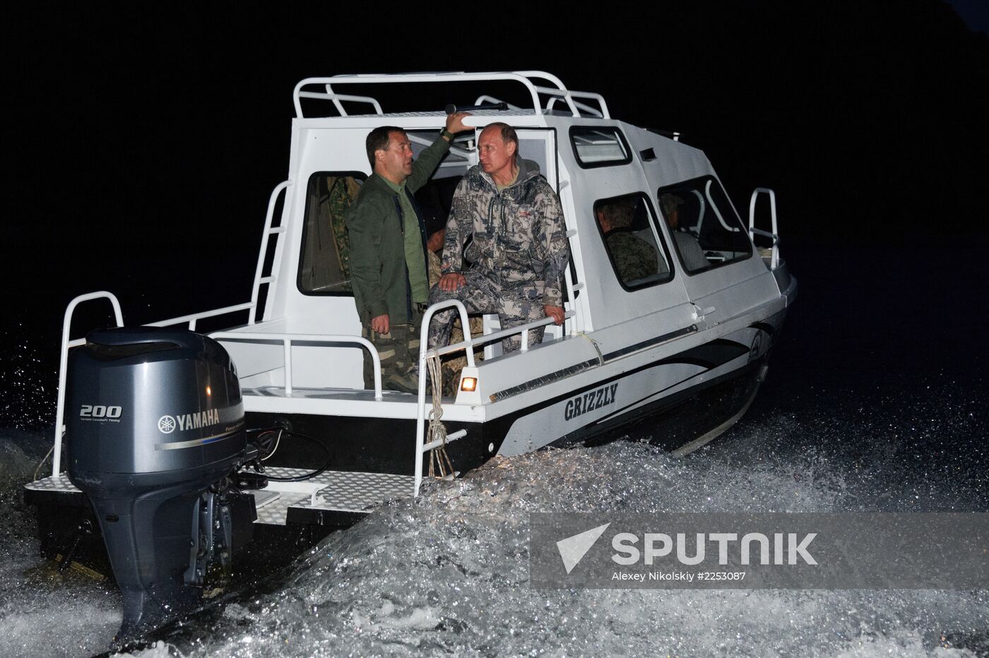 Vladimir Putin and Dmitry Medvedev on holiday