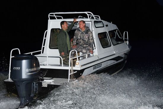 Vladimir Putin and Dmitry Medvedev on holiday