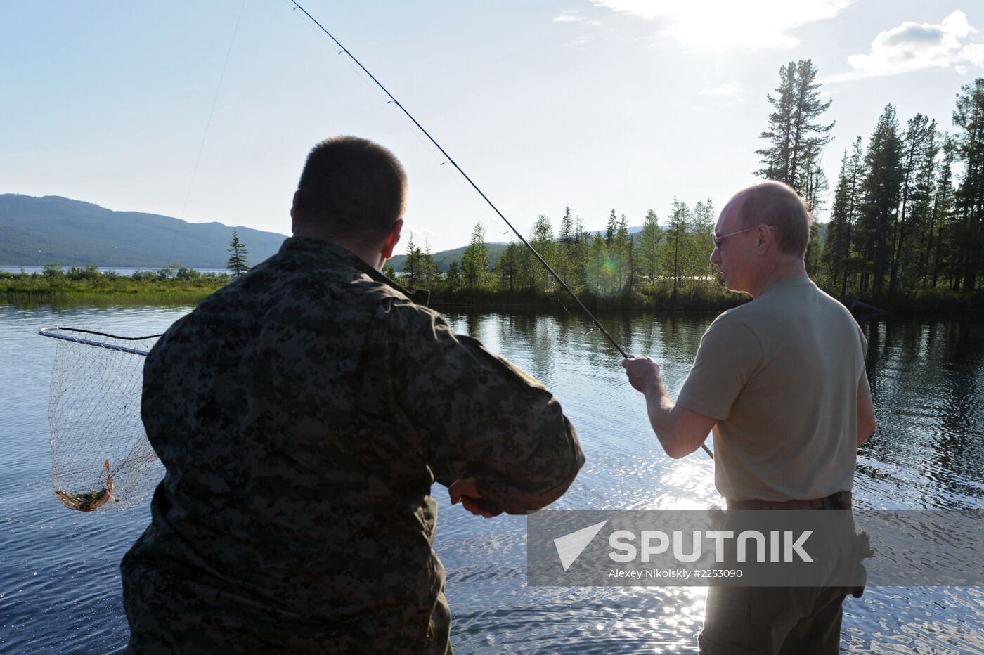 Vladimir Putin and Dmitry Medvedev on holiday