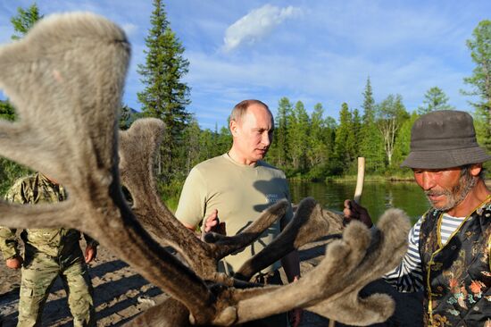 Vladimir Putin and Dmitry Medvedev on holiday