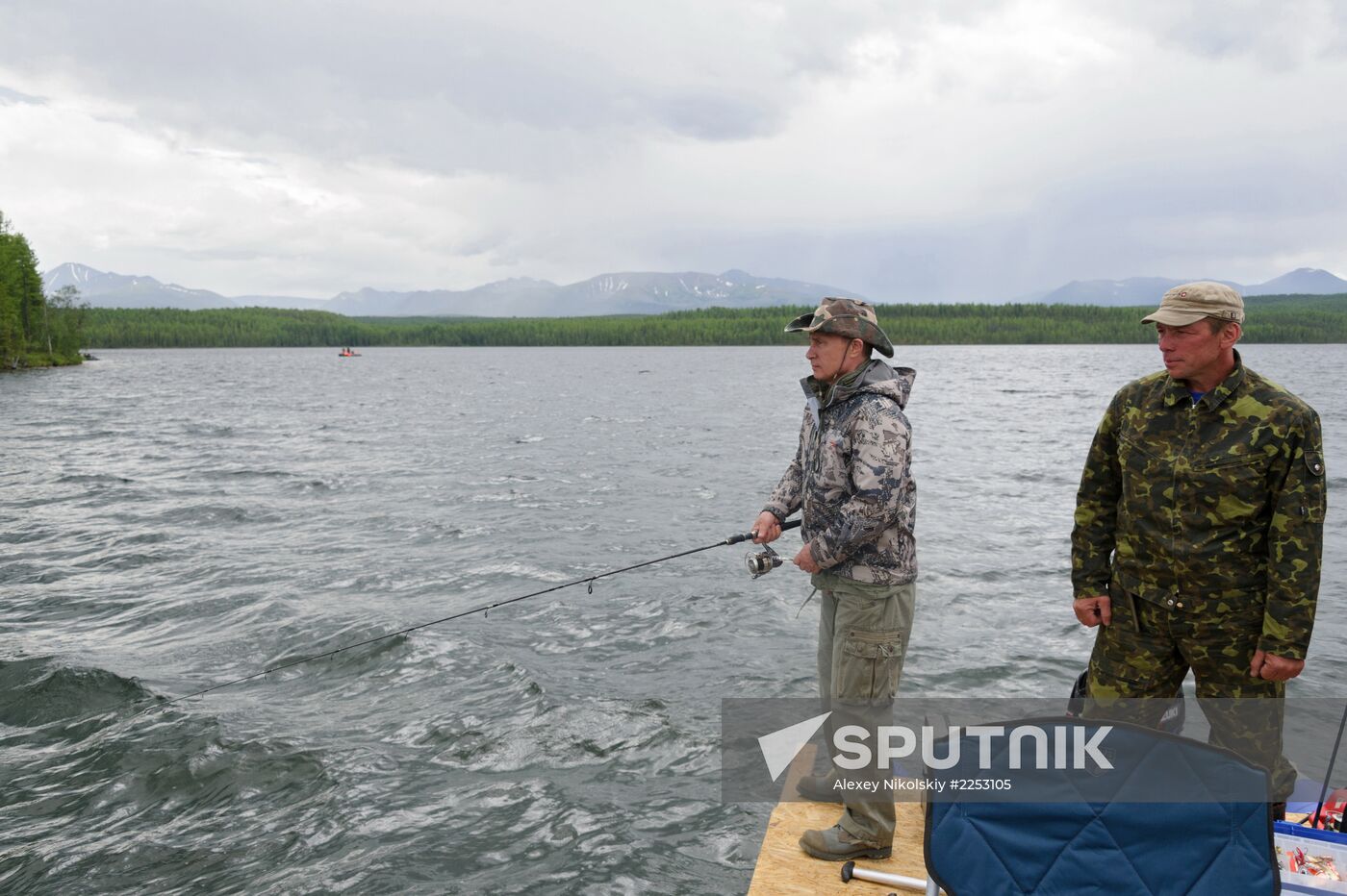 Vladimir Putin and Dmitry Medvedev on holiday