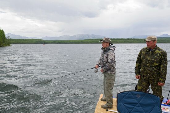 Vladimir Putin and Dmitry Medvedev on holiday