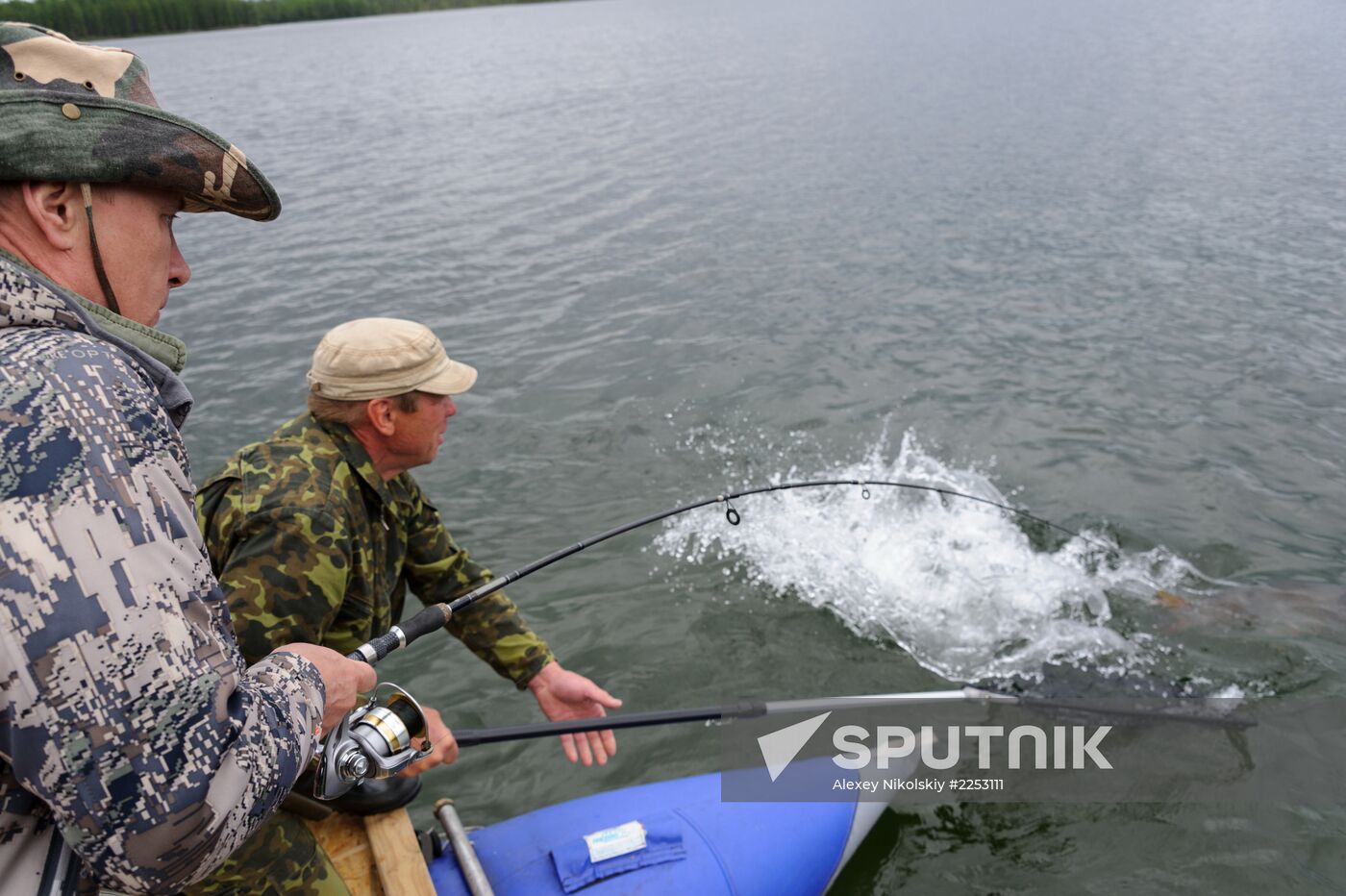 Vladimir Putin and Dmitry Medvedev on holiday