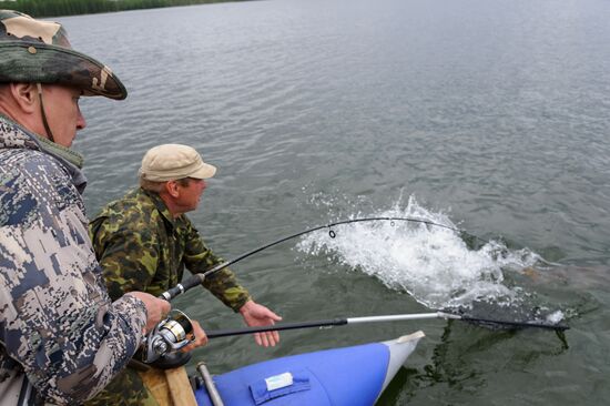 Vladimir Putin and Dmitry Medvedev on holiday