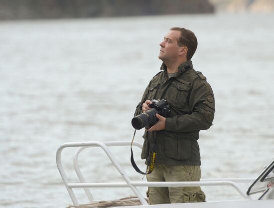 Vladimir Putin and Dmitry Medvedev on holiday