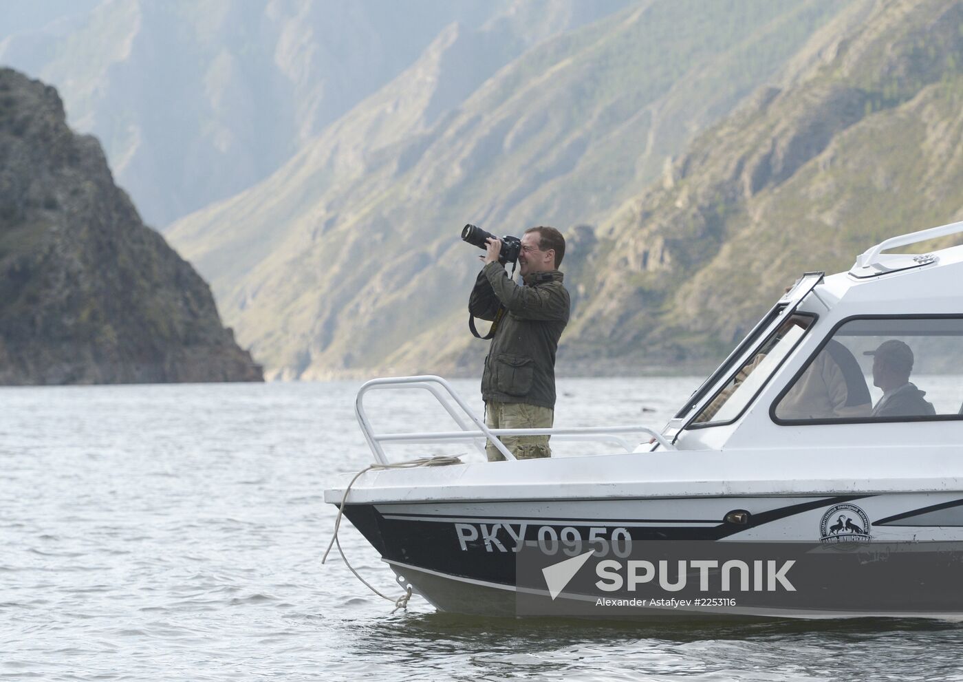 Vladimir Putin and Dmitry Medvedev on holiday