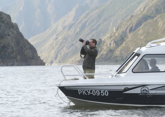 Vladimir Putin and Dmitry Medvedev on holiday