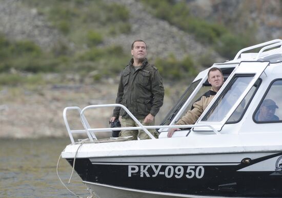 Vladimir Putin and Dmitry Medvedev on holiday