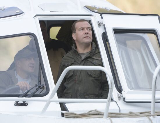 Vladimir Putin and Dmitry Medvedev on holiday