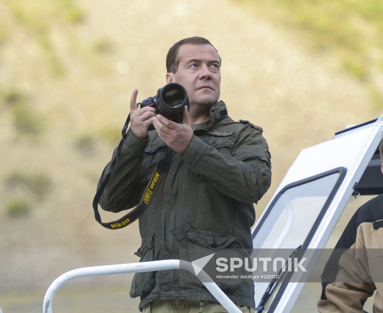 Vladimir Putin and Dmitry Medvedev on holiday