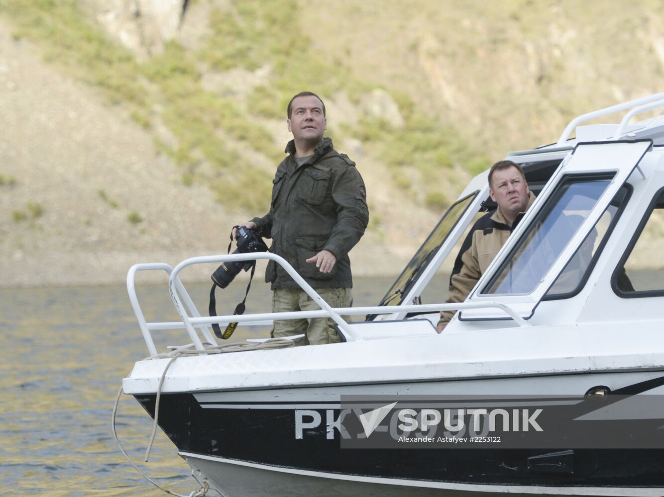 Vladimir Putin and Dmitry Medvedev on holiday