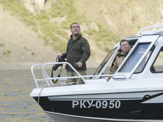 Vladimir Putin and Dmitry Medvedev on holiday