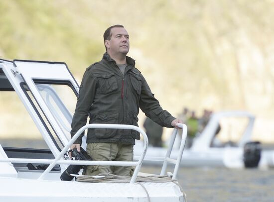 Vladimir Putin and Dmitry Medvedev on holiday