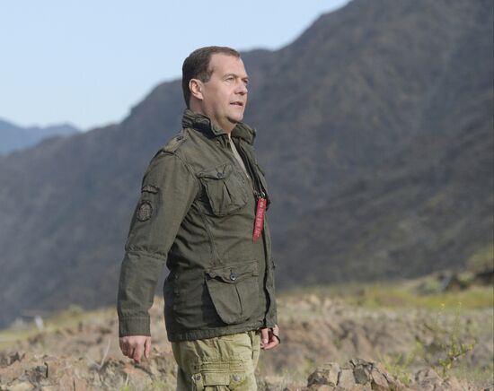 Vladimir Putin and Dmitry Medvedev on holiday