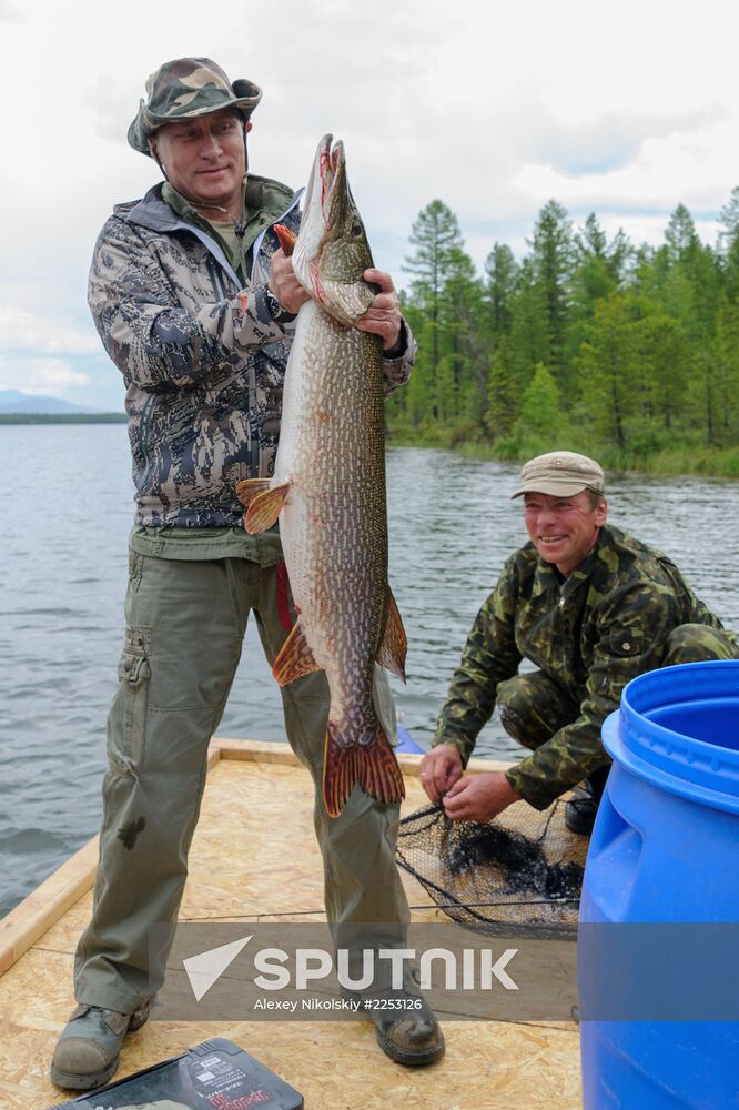 Vladimir Putin and Dmitry Medvedev on holiday