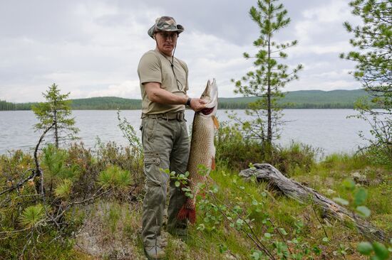 Vladimir Putin and Dmitry Medvedev on holiday