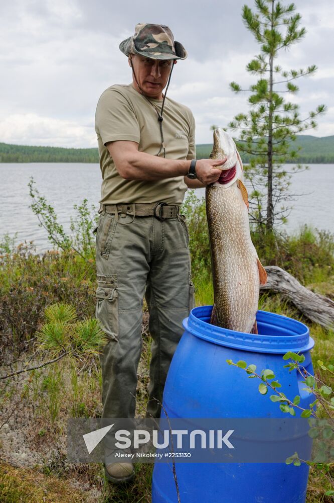 Vladimir Putin and Dmitry Medvedev on holiday