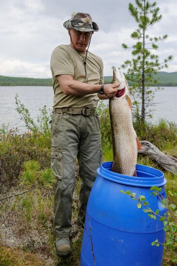 Vladimir Putin and Dmitry Medvedev on holiday