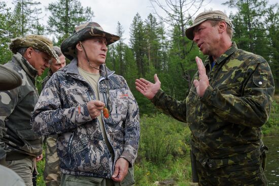 Vladimir Putin and Dmitry Medvedev on holiday