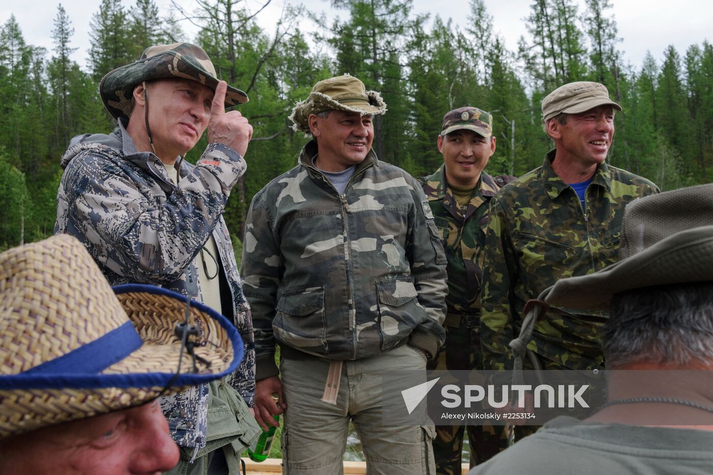 Vladimir Putin and Dmitry Medvedev on holiday