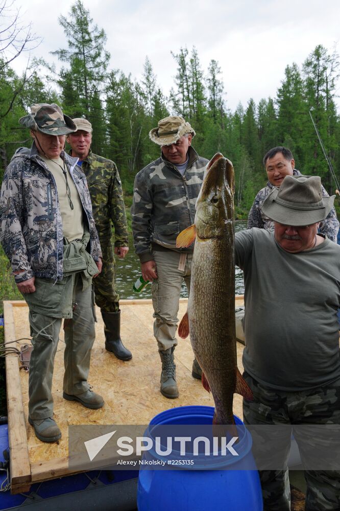 Vladimir Putin and Dmitry Medvedev on holiday