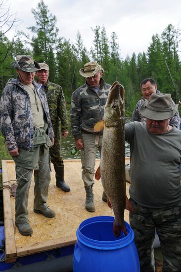 Vladimir Putin and Dmitry Medvedev on holiday