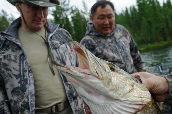 Vladimir Putin and Dmitry Medvedev on holiday