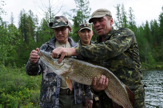Vladimir Putin and Dmitry Medvedev on holiday