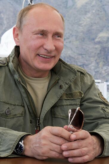 Vladimir Putin and Dmitry Medvedev on holiday