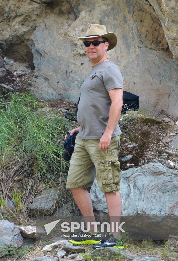 Vladimir Putin and Dmitry Medvedev on holiday