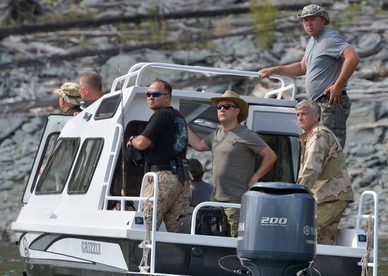 Vladimir Putin and Dmitry Medvedev on holiday