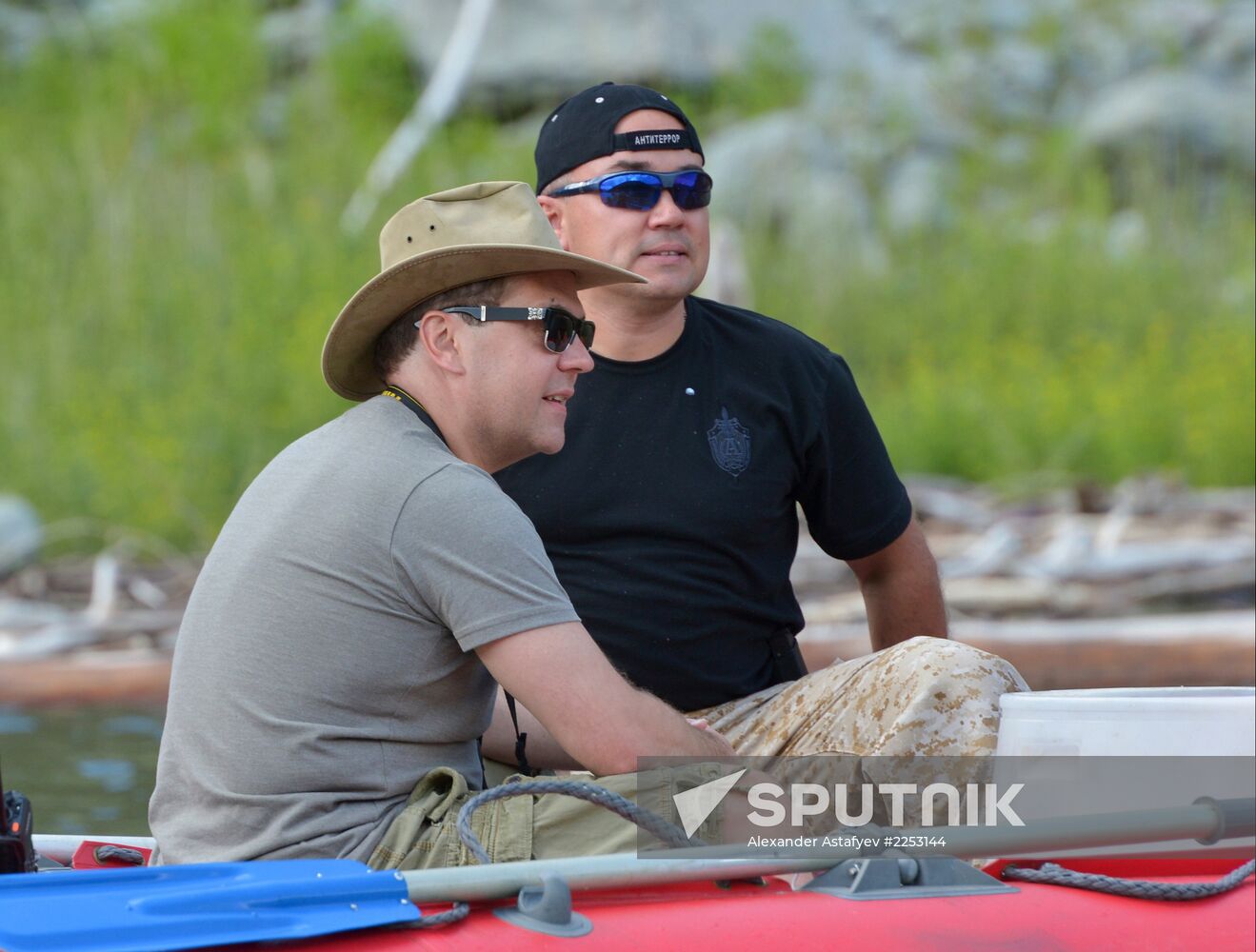 Vladimir Putin and Dmitry Medvedev on holiday