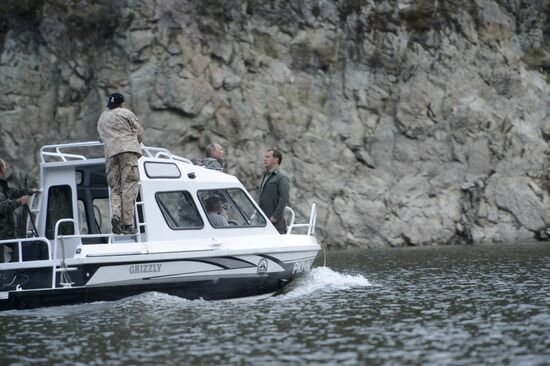 Vladimir Putin and Dmitry Medvedev on holiday